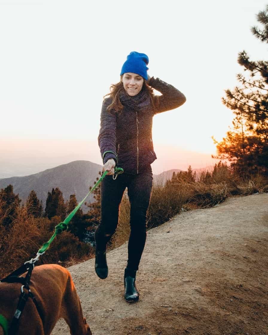 Woman and Dog Walking Woman walking with dog