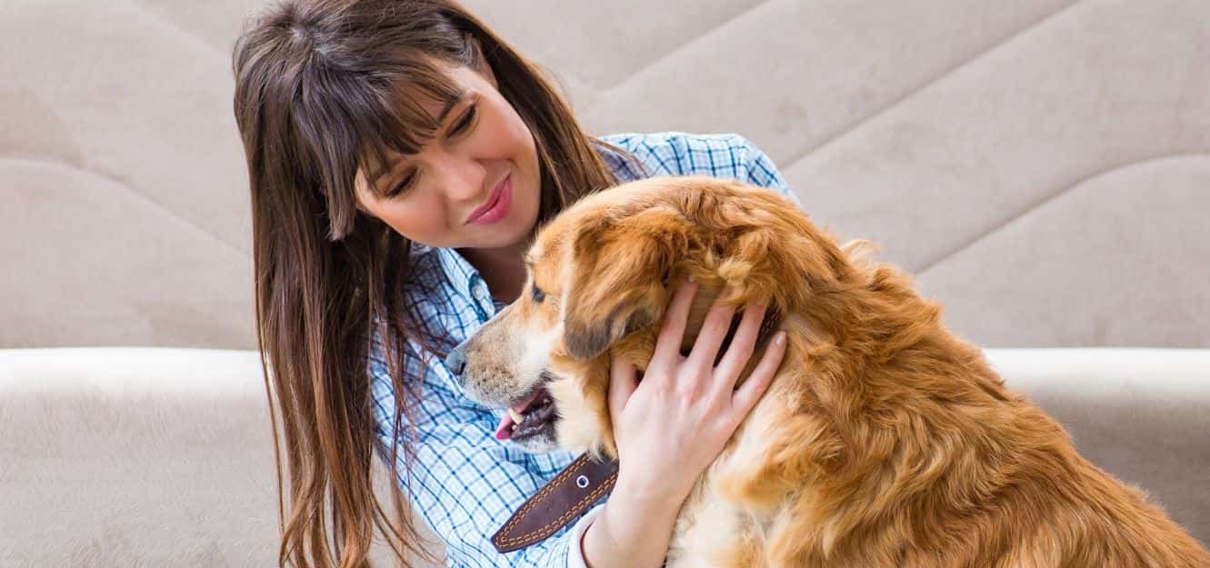 Lady and Dog Lady makes sure her dog is healthy